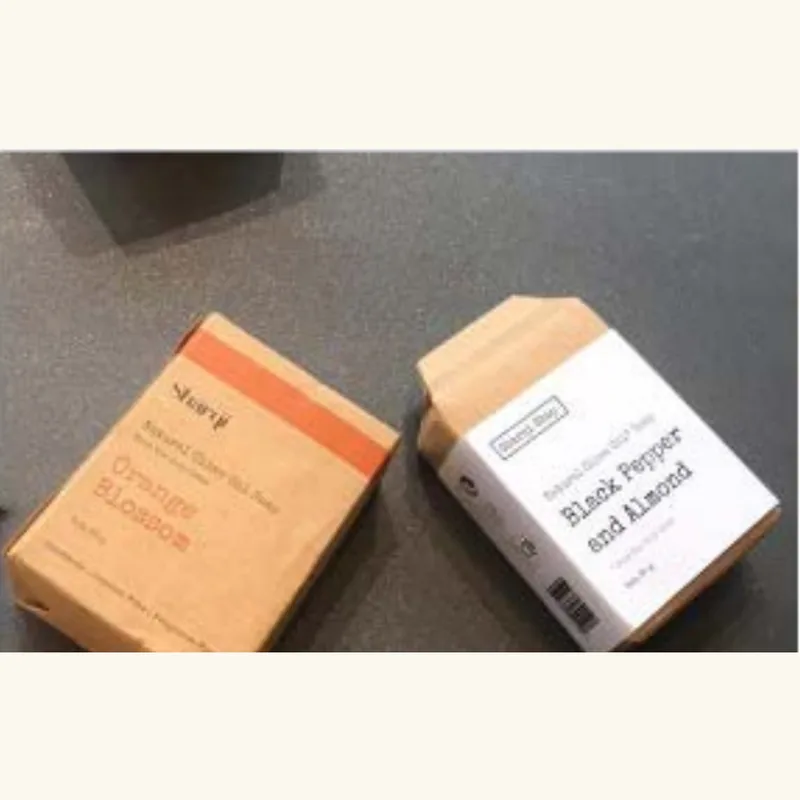 The same Aleppo soap boxed and labelled in two retail cartons ready for shipping